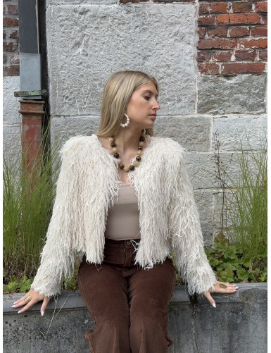 Gilet ouvert à frou-frou...