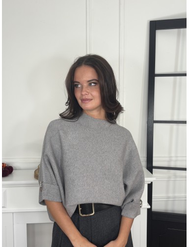 Pull avec broche et ample...