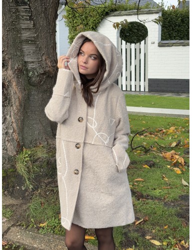 Manteau long et ample beige...