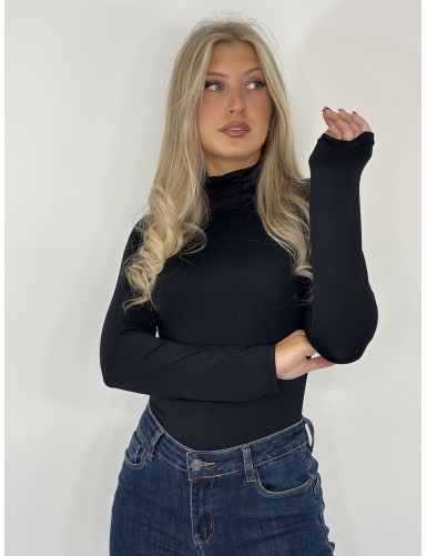 Blouse à col roulé unie...