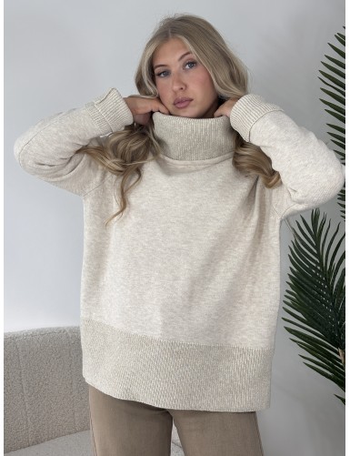 Pull col roulé à paillettes...