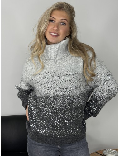 Pull col roulé à sequins...
