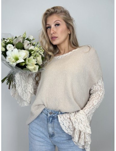 Pull sans manche col V uni...